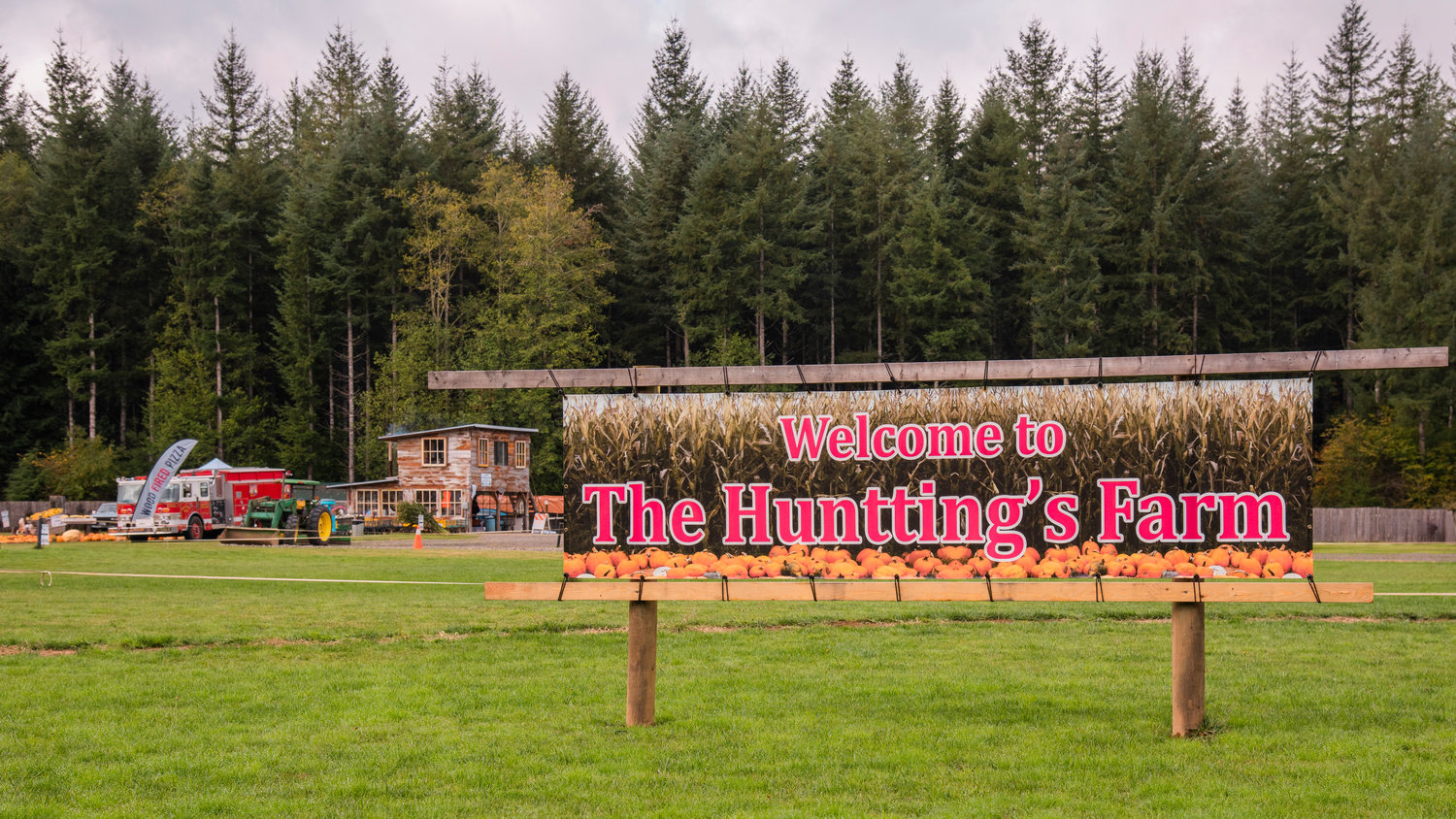 A sign welcomes visitors to The Huntting’s Farm which includes a pumpkin patch and haunted forest seen Wednesday in Cinebar.